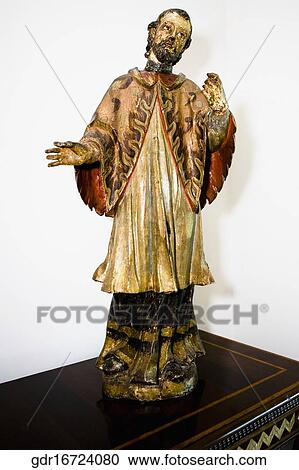 Close-up of a statue on a chest View Large Photo Image Stock Image - Close-up of a statue on a chest. Fotosearch