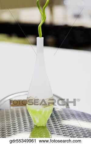 Stock Image - Close-up of a vase on a table. Fotosearch