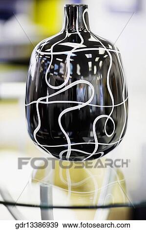 Stock Photo - Close-up of a vase on a table. Fotosearch