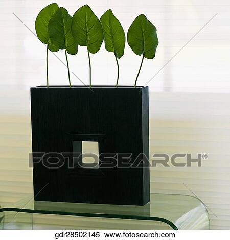 Stock Photography - Close-up of a vase on a table. Fotosearch