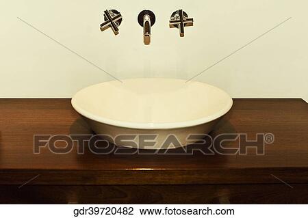 Close-up of a wash bowl in the bathroom View Large Photo Image Stock Image - Close-up of a wash bowl in the bathroom. Fotosearch