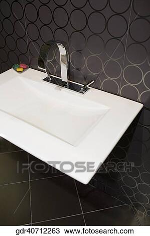 Close-up of a washbasin in the bathroom View Large Photo Image Stock Image - Close-up of a washbasin in the bathroom. Fotosearch