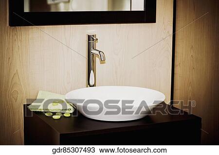 Stock Image - Close-up of a washbasin in the bathroom. Fotosearch