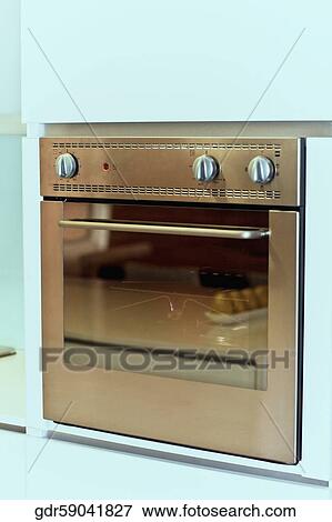 Close-up of an oven in the kitchen View Large Photo Image Stock Photo - Close-up of an oven in the kitchen. Fotosearch
