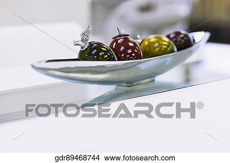 Picture - Close-up of artificial fruits in a bowl. Fotosearch