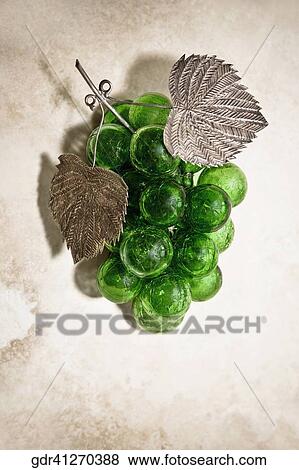 Stock Photo - Close-up of artificial grapes. Fotosearch