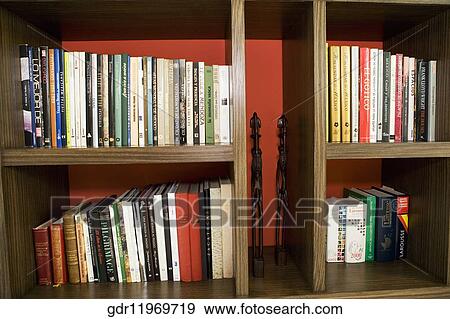 Close-up of books in a book shelf View Large Photo Image Stock Photo - Close-up of books in a book shelf. Fotosearch