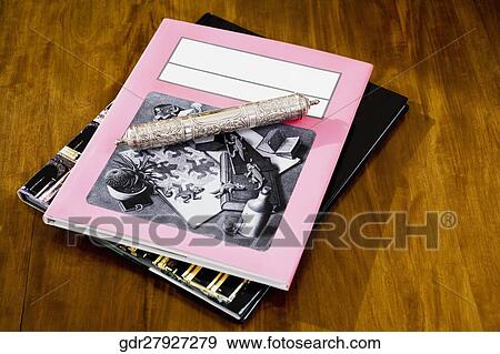 Stock Photo - Close-up of books on a table. Fotosearch