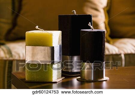 Close-up of candles on a table View Large Photo Image Stock Image - Close-up of candles on a table. Fotosearch