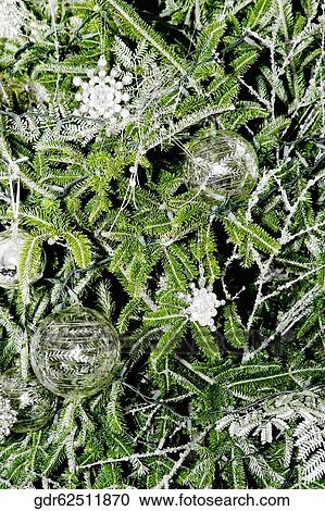 Close-up of Christmas ornaments hanging on a Christmas tree View Large Photo Image Stock Image - Close-up of Christmas ornaments hanging on a Christmas tree. Fotosearch