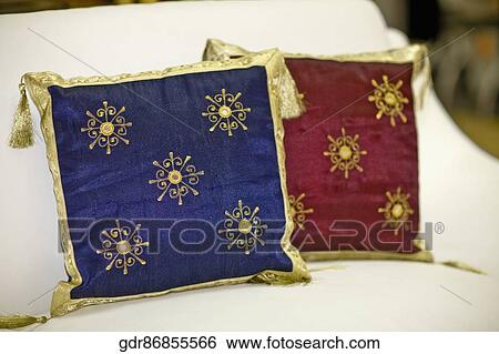 Close-up of cushions on a couch View Large Photo Image Stock Photograph - Close-up of cushions on a couch. Fotosearch