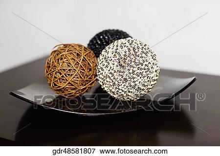 Stock Photo - Close-up of decorative balls on a table. Fotosearch