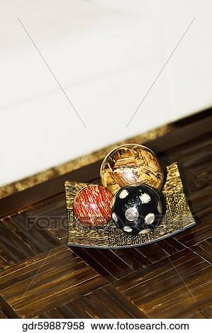 Close-up of decorative balls on a table View Large Photo Image Stock Photo - Close-up of decorative balls on a table. Fotosearch