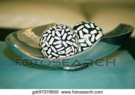 Close-up of decorative balls on a tray View Large Photo Image Stock Image - Close-up of decorative balls on a tray. Fotosearch