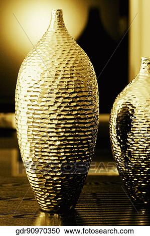 Stock Image - Close-up of decorative urns. Fotosearch