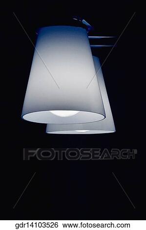 Stock Photograph - Close-up of electric lights lit up. Fotosearch
