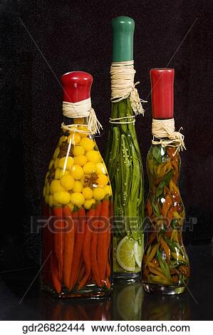 Close-up of pickle bottles View Large Photo Image Picture - Close-up of pickle bottles. Fotosearch