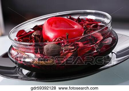 Stock Photo - Close-up of rose petals in a bowl. Fotosearch