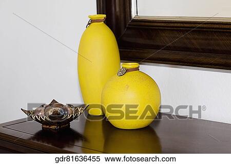 Close-up of showpieces on a sideboard View Large Photo Image Stock Photography - Close-up of showpieces on a sideboard. Fotosearch