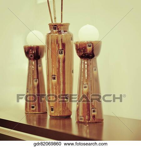 Close-up of showpieces on a table View Large Photo Image Stock Image - Close-up of showpieces on a table. Fotosearch