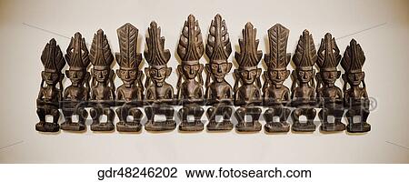 Close-up of statues in a row View Large Photo Image Stock Image - Close-up of statues in a row. Fotosearch