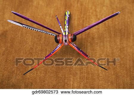Close-up of the statue of a dragonfly View Large Photo Image Stock Image - Close-up of the statue of a dragonfly. Fotosearch