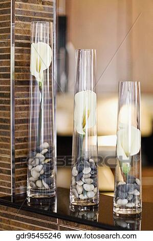 Close-up of three vases View Large Photo Image Stock Photograph - Close-up of three vases. Fotosearch
