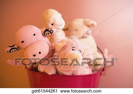 Close-up of toys in a container View Large Photo Image Stock Image - Close-up of toys in a container. Fotosearch