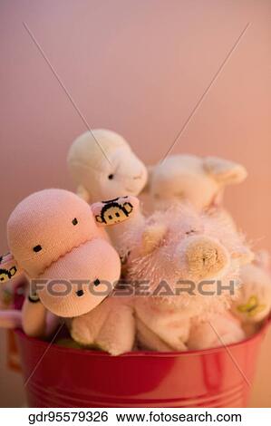 Close-up of toys in a container View Large Photo Image Stock Photograph - Close-up of toys in a container. Fotosearch