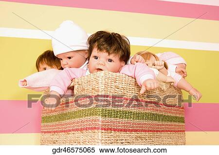 Stock Photography - Close-up of toys in a container. Fotosearch