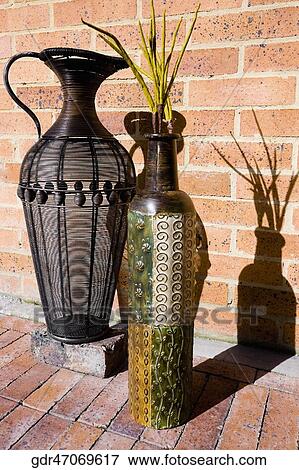Close-up of two decorative urns View Large Photo Image Stock Photo - Close-up of two decorative urns. Fotosearch