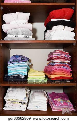 Closet full of clothing View Large Photo Image Stock Photo - Closet full of clothing. Fotosearch