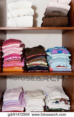 Closet full of clothing View Large Photo Image Stock Photo - Closet full of clothing. Fotosearch