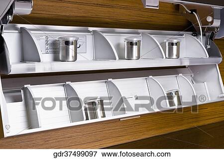 Containers on shelves in the kitchen View Large Photo Image Stock Photo - Containers on shelves in the kitchen. Fotosearch