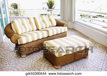 Couch in a balcony View Large Photo Image Picture - Couch in a balcony. Fotosearch