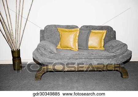 Couch with a decorative urn in a living room View Large Photo Image Stock Photography - Couch with a decorative urn in a living room. Fotosearch