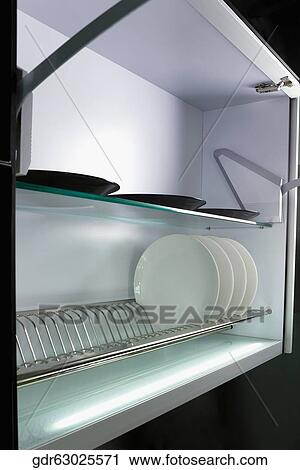 Crockery on racks View Large Photo Image Stock Image - Crockery on racks. Fotosearch