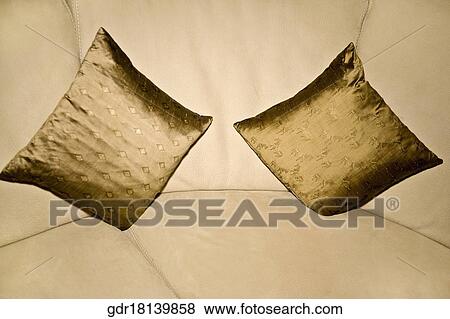 Stock Photo - Cushions on a couch. Fotosearch