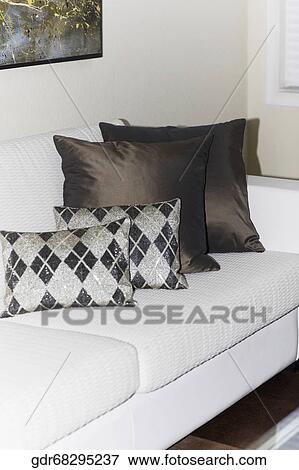 Cushions on a couch View Large Photo Image Stock Photo - Cushions on a couch. Fotosearch