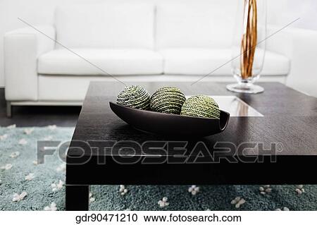 Decorative balls and a vase on a table View Large Photo Image Stock Image - Decorative balls and a vase on a table. Fotosearch