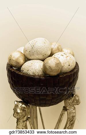 Stock Image - Decorative balls in a bowl. Fotosearch