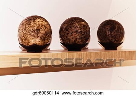 Picture - Decorative balls on a rack. Fotosearch