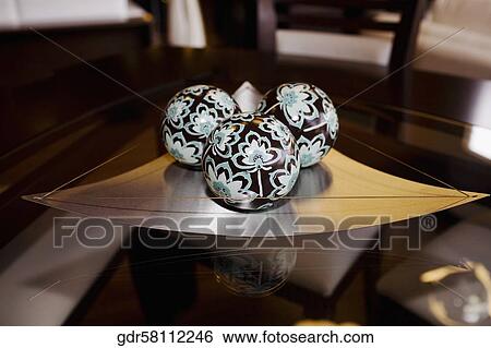 Decorative balls on a tray View Large Photo Image Stock Photograph - Decorative balls on a tray. Fotosearch