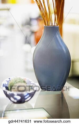 Decorative urn and decorative balls on a table View Large Photo Image Stock Image - Decorative urn and decorative balls on a table. Fotosearch