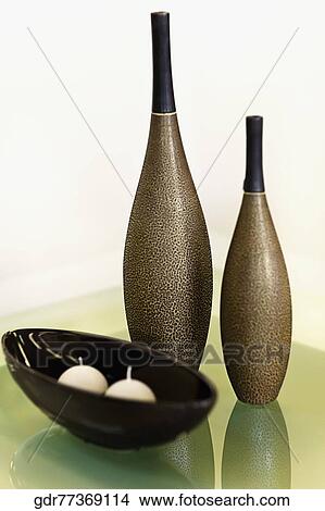 Decorative urns with decorative balls on a table View Large Photo Image Picture - Decorative urns with decorative balls on a table. Fotosearch