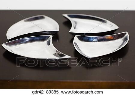 Empty plates on a table View Large Photo Image Stock Photography - Empty plates on a table. Fotosearch