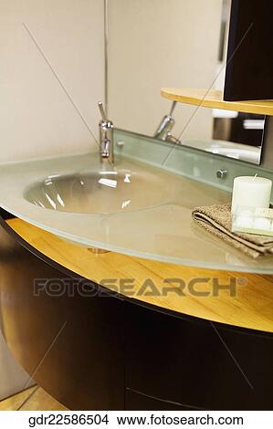 Faucet on a bathroom sink View Large Photo Image Picture - Faucet on a bathroom sink. Fotosearch