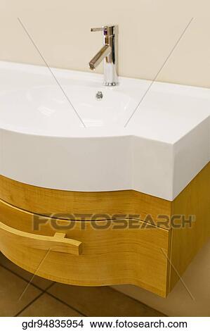 Faucet on a bathroom sink View Large Photo Image Picture - Faucet on a bathroom sink. Fotosearch