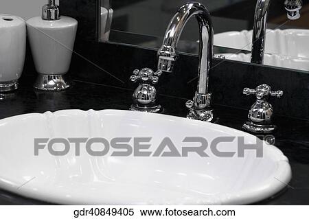 Faucet on a wash bowl View Large Photo Image Stock Photography - Faucet on a wash bowl. Fotosearch