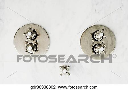 Faucets in a bathroom View Large Photo Image Stock Image - Faucets in a bathroom. Fotosearch